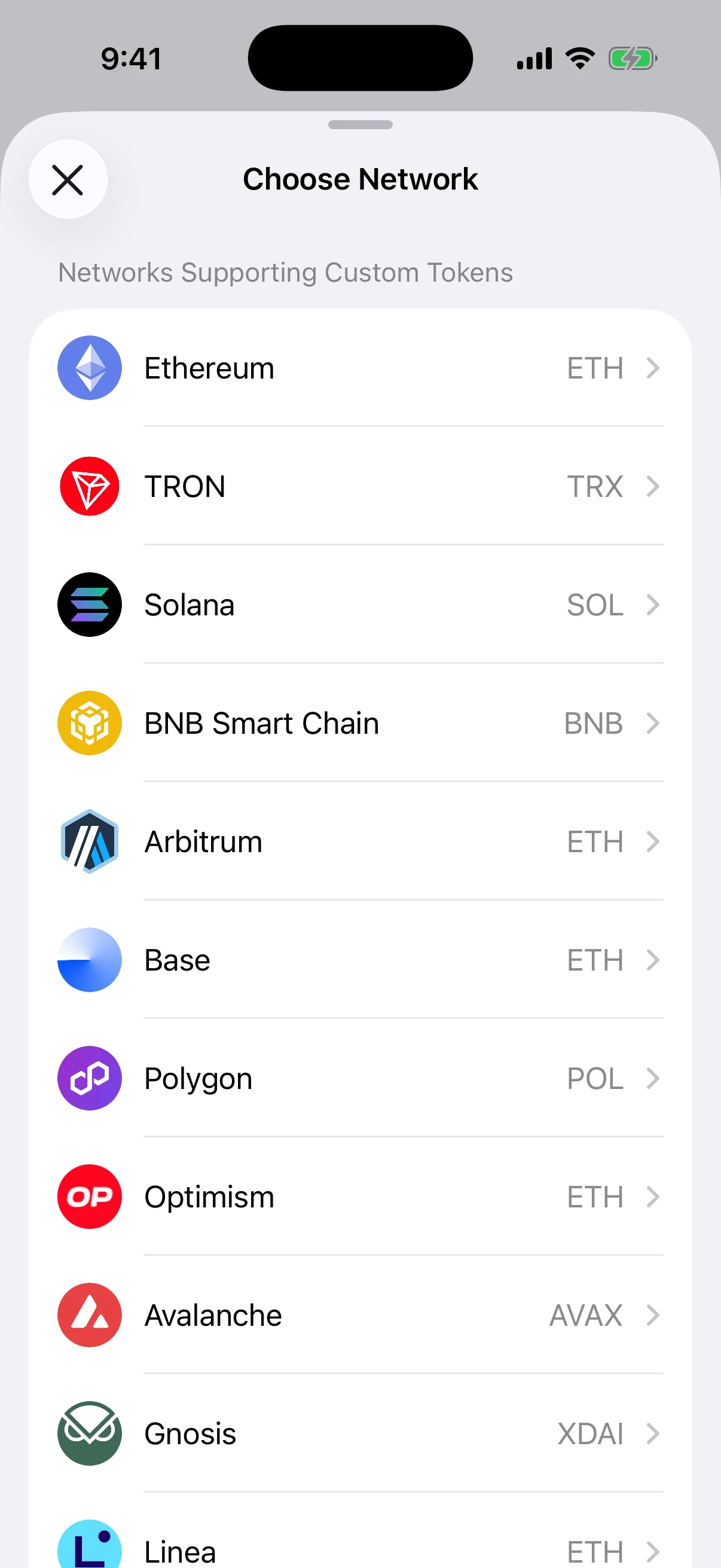 Choose the mainnet where the token was issued Real Oath custom-token network picker showing supported mainnets in the iOS Simulator