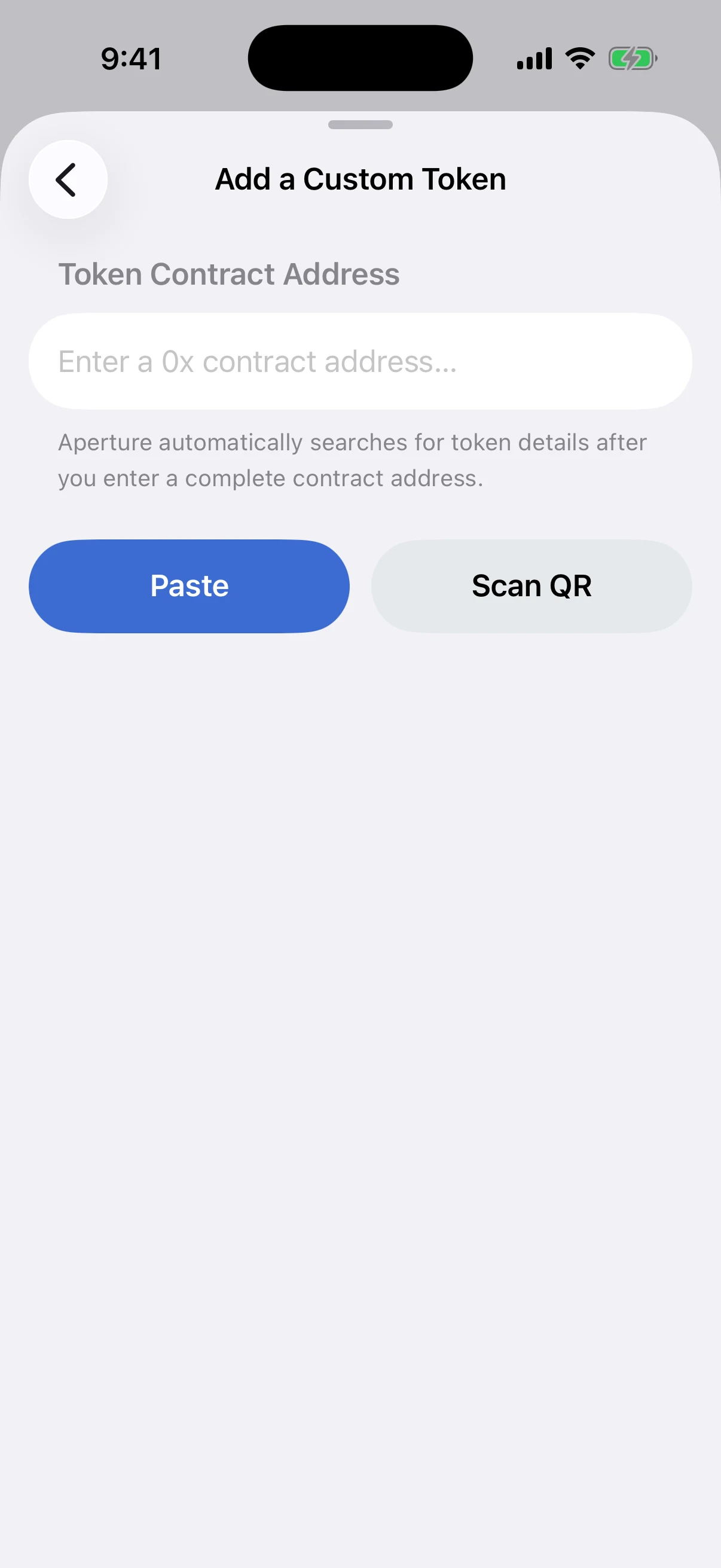 Enter, paste, or scan the verified contract address Real Oath Add a Custom Token screen for entering or scanning an Ethereum contract address